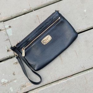 Gently used Michael Kors clutch bag.